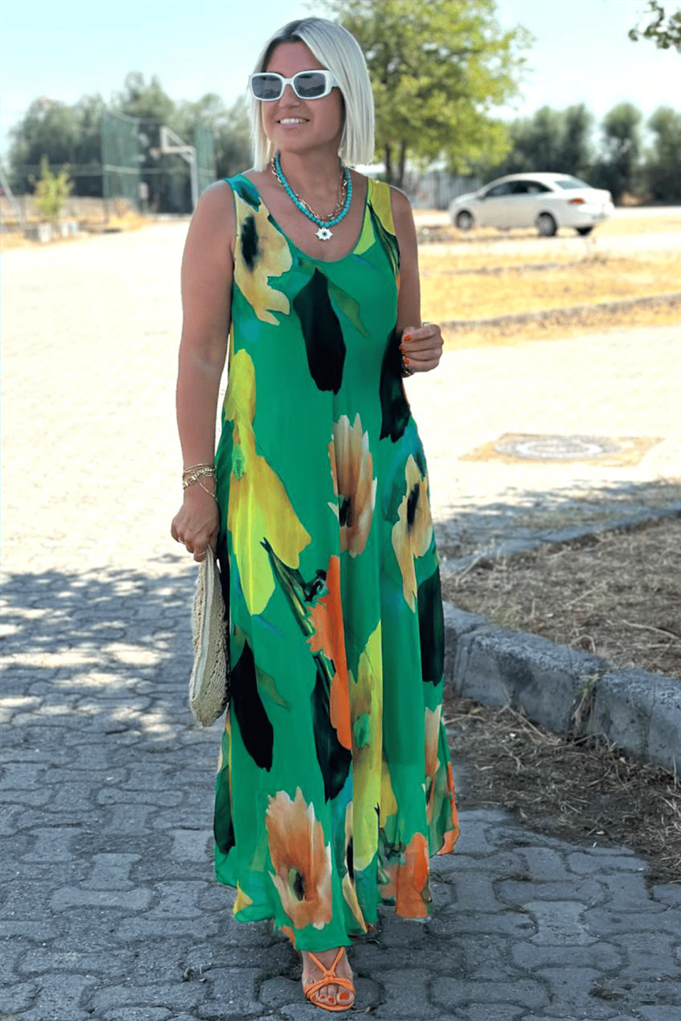 Maxi dress made of silk chiffon with a floral pattern and a U-shaped neckline